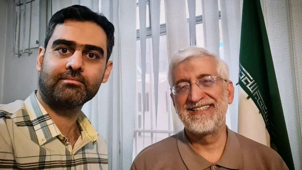 امیر حسین ثابتی نماینده مجلس در کنار کاندیدای مطبوعش در انتخابات سعید جلیلی